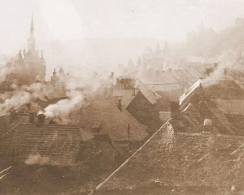 město